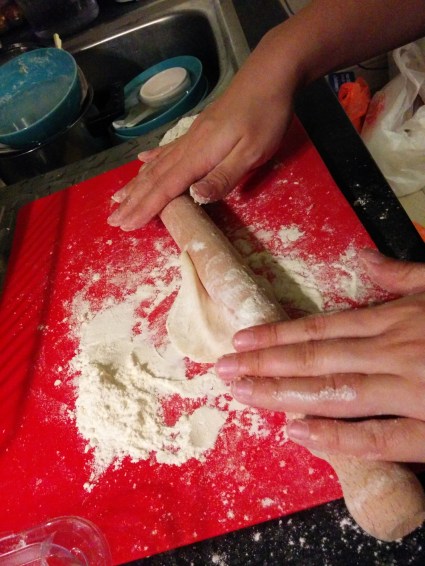 rolling out dumpling wrappers